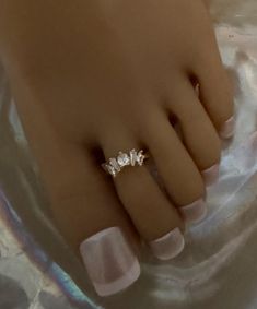 This gold toe ring features a stunning princess crown with five crystal accents that adorn the toe. This toe ring is size adjustable and one size fits most. Comfortable and versatile, it will lend itself to casual or formal events. All items are made in a smoke free environment. *If there is any issue with your toe ring, please let me know so that I can correct it. Thanks for visiting my shop!👣 Gold Crystal Promise Ring With Rhinestones, Rhinestone Toe Ring Jewelry, Adjustable Gold Crystal Ring With Bling, Adjustable Gold Crystal Bling Ring, Gold Toe Rings, Columbia Tn, Ring Crown, Ring Crystal, Silver Toe Rings