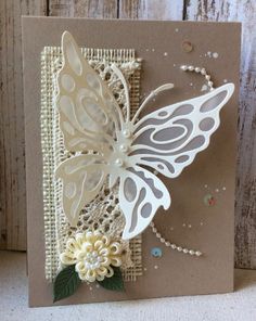 a close up of a card with a butterfly on it