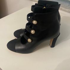 Authentic Chanel 2018 Black Cap Toe Leather Pearl Button Bootie Boots Size 35 And A Half With Zipper On The Side Chanel Boots, Pearl Leather, Black Cap, Baddie Hairstyles, Chanel Shoes, On The Side, Bootie, Bootie Boots, Ankle Boots