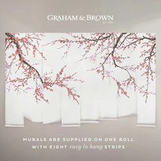 an advertisement for graham & brown featuring cherry blossoms on white paper with text that reads, murals are supplied on one roll with eight easy to hang strips