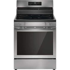 an electric stove with the door open and its oven on top of it's burners