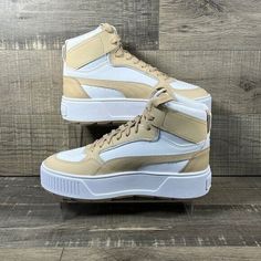 Puma Karmen Rebelle Mid 387213-04 Size 7 Brand New Shoes, In Damaged Original Box. Never Worn. No Rips, Tears, Or Stains. Smoke Free Environment. Ships Carefully Packaged And Boxed Right Away. Let Us Know If You Have Any Questions! 387213-04 If You’re Interested In Multiple Pairs From Our Closet We Offer Bundle Deals So Feel Free To Look Around, Like, And Bundle! White High-top Sneakers With Puma Logo For Sneakerhead Events, Casual Puma High-top Sneakers, Casual White High-top Sneakers With Puma Logo, Puma High-top Sneakers For Sports, Casual White High-top Puma Sneakers, White Casual High-top Puma Sneakers, Puma High-top Sneakers With Round Toe For Sports, White Puma High-top Sneakers, Puma High-top Synthetic Sneakers