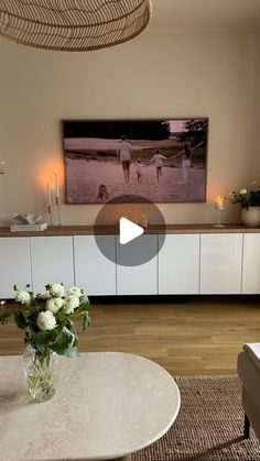 the living room is clean and ready to be used as a dining area for entertaining