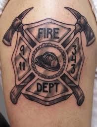 a fire department tattoo on the arm