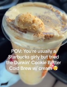 an ice cream sundae in a plastic cup with toppings on top and the words pov you're usually a starbucks girl but tried the dunkin'cookie butter cold