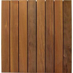 a brown wooden fence with vertical slats