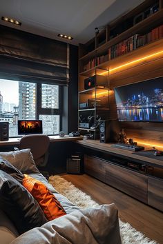 a living room filled with furniture and a flat screen tv sitting on top of a wooden shelf