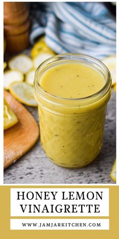 a jar filled with honey lemon vinaigrette