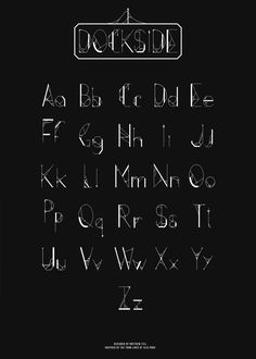 the font and numbers are drawn in white ink on black paper, which is also used for