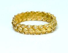 Created with Shogun. Gold Diamond Bracelet. Vintage 18K yellow gold diamond bracelet set with 44 round brilliant diamonds. This bracelet can be sized to fit a smaller wrist by removing links. Weight: 62 GramsMeasurements: Length: 8" Width: 0.6" Condition: Excellent Luxury 22k Gold Yellow Bracelet, Luxury Vintage Yellow Jewelry, Luxury Antique Yellow Gold Chain Bracelet, Gold Diamond Bracelet, Antique Bracelets, Bracelets Gold Diamond, Diamonds And Gold, Bracelet Vintage, Brilliant Diamond