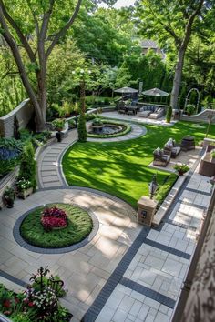 an outdoor patio with landscaping and seating area in the center, surrounded by lush green trees