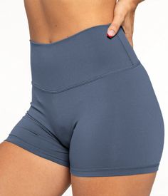 Introducing our seamless women's shorts. We've named these shorts LUXE because they're next level in high quality and comfort. Built with a special blend of nylon and spendex to allow for more freedom of movement during your most rigorious workout sessions. It contains stretchy, moisture-wicking fabric to keep you cool and without distractions to perform at your best! Rose is 5'6'' wearing size S 80% Nylon / 20% Spandex 4.4 inch inseam Designed with Pefect Scrunch Squat proof High Stretch Nylon Shorts In Solid Color, High Stretch Solid Nylon Shorts, Stretch Nylon Shorts In Solid Color, Seamless Solid Athletic Shorts For Gym, High Stretch Athletic Shorts With Built-in Shorts, Compressive Athletic Shorts For Gym In Gray, Gray Compressive Athletic Shorts For Gym, Compressive Gray Athletic Shorts For Gym, Solid Seamless Athleisure Shorts