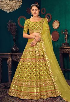 Green georgette lehenga choli 1825  Desc:  Style : Circular Lehenga Choli Color : Green Fabric : Georgette Work : Thread   Embroidery Wash Care : Dry clean Sleeve Style : Half Sleeve Long Sleeves : Done only in Custom Stitch Sleeves Lining : Done only in Custom Stitch Bust Size : 32 to 42 Inches Occasion : Festival   Diwali   Mehendi   Sangeet   Reception   Ceremonial   Baby Shower. With Express Free Shipping and Custom Stitching, Buy Indian Wedding Party Wear Lehenga Green georgette lehenga cho Green Wedding Lehenga, Choli Style, Lehenga Yellow, Lime Green Weddings, Bridal Wedding Lehenga, Latest Lehenga Choli, Blouse Lehenga, Indian Wedding Sarees, Lehenga Choli Designs