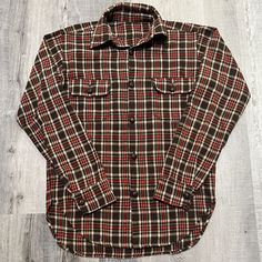 VTG 70s Brown/Orange Plaid Fat Button Double Pocket Casual Acrylic Flannel Shirt Missing tag pretty sure the buttons are 70s Perfect condition no flaws found  Fits as a big medium or smaller large Measurements  Pit to pit 21.5 Length 28.5 Brown Button-up Flannel Shirt With Pockets, Classic Brown Button-up Flannel Shirt, Classic Brown Flannel Shirt With Pockets, Brown Camp Collar Shirt With Buttons, Brown Shirt With Camp Collar And Buttons, Classic Brown Flannel Shirt With Button Closure, Brown Button Closure Flannel Shirt For Work, Brown Flannel Shirt With Button Closure For Work, Brown Shirt With Camp Collar