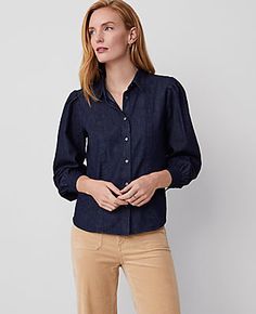 Elevate your wardrobe with the Ann Taylor Fitted Button Shirt, a perfect blend of sophistication and ease. This dark chambray shirt for women is meticulously designed to enhance your silhouette while providing comfort.

- **Size**: Large
- **Color**: Dark Chambray
- **Material**: 100% Cotton
- **Gender**: Female
- **Features**:
  - Point collar
  - Long sleeves with pleated caps and button cuffs
  - Button front closure
  - Shirttail hem
  - Machine washable

Ideal for both office and casual set Classic Tops With Rolled Sleeves For Fall, Business Casual Button-up Top With Button Cuffs, Collared Blouse With Rolled Sleeves For Fall, Fall Collared Blouse With Rolled Sleeves, Workwear Tops With Rolled Sleeves And Spread Collar, Fall Top With Spread Collar And Cuffed Sleeves, Fall Blouse With Rolled Sleeves And Collar, Slim Fit Blouse With Buttons For Fall, Fall Tops With Button Cuffs And Spread Collar