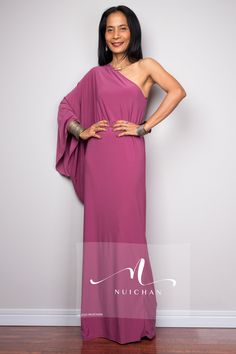 "One shoulder dress, Long pink dress, Off shoulder evening dress, dusty pink cocktail dress, pink party dress PRODUCT SIZE : Free Size * Chest : 40\" will stretch to 44\" * Waist : 40\" will stretch to 44\" * Hips : 40\" will stretch to 44\" * Sleeve length : 23\" * Length : 57\" - 58\" from shoulder to hem (measured when laying flat) MATERIAL : * ITY (polyester jersey) > soft and comfortable to wear, not as slippery as spandex. NOTE : * Model chest : 32\", waist : 24\" hips : 35\" * Combined Pink One-shoulder Dress With Asymmetrical Neckline For Gala, Pink One Shoulder Dress With Asymmetrical Neckline For Gala, Pink One-shoulder Dress For Gala, Party Dress With One Shoulder And Draped Sleeves, One-shoulder Party Dress With Draped Sleeves, Fitted Pink One Shoulder Dress For Evening, Pink Fitted One Shoulder Evening Dress, Asymmetrical Neckline Maxi Dress With Draped Sleeves For Party, Pink Formal Dress With Draped Sleeves