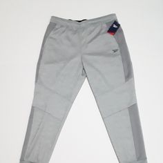 Reebok Foul Line Jogger Sweat Pants. Condition Is "New With Tags". Mens's Size Large. Features Front Pockets, One Backside Pocket With Zip Closure, Drawstring With Elastic Waistband, Heavyweight Jogger Sweatpants. 100% Polyester. Made In China. Silver Sporty Sports Bottoms, Sweat Pants, Jogger Sweatpants, Mens Pants, Sweatpants, Man Shop, China, Elastic, Tags