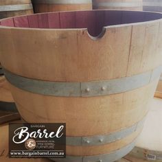 several wooden barrels stacked on top of each other