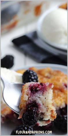 a close up of a plate of food with berries and ice cream