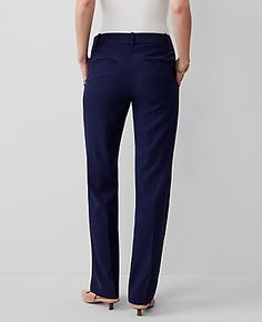 Elevate your wardrobe with the Ann Taylor Mid Rise Straight Pant, a perfect blend of sophistication and comfort. These navy pants are tailored to flatter with a straight leg design that skims the legs for a sleek, timeless look.

- **Size:** Regular 6
- **Color:** Navy
- **Gender:** Female
- **Material:** 73% Polyester, 24% Rayon, 3% Spandex
- **Fit:** Tailored and fitted
- **Rise:** Mid rise, sits 2 1/4" below natural waist
- **Length:** Full length; 31" inseam with 16 1/2" leg opening
- **Clos Elegant Straight Bottoms With Belt Loops, Petite Suits, Shoe Wishlist, Blazer And Skirt, Suits For Sale, Sweater Sale, Navy Pants, Petite Fashion, White Summer