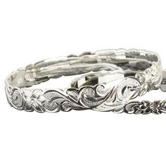 Solid 925 Sterling Silver Queen Scroll Cut Out Edge BangleItem Number: B1052All weights and measurements are approximate and may vary slightly from listed information as below:Weight: 14.5-48 gramBand Width: 6mm, 8mm, 10mm, 12mmMaterial: 925 Sterling SilverThis beautiful bangle is made with 925 (92.5%) Sterling Silver which is the highest concentration of silver allowed in jewelry. Laser engravings are for the inside of the bangle ONLY. Once an item has been engraved it cannot be exchanged or re