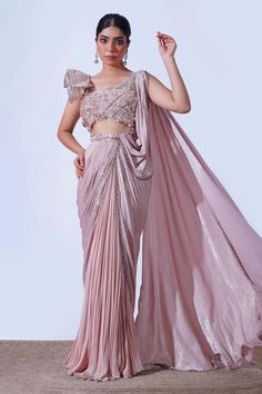 Peach flutter sleeves padded draped saree gown with ivy bloom embroidery on the bodice using thread, zari, sequins, glass beads, pearls, crystals highlights and cascading flow draped  and pleated saree skirt detailing. - Aza Fashions Elegant Pink Gown With Cape Sleeves, Silk Evening Dress With Cape Sleeves For Wedding, Fitted Flutter Sleeve Evening Dress For Wedding, Pre-draped Gala Gown With Cape Sleeves, Fitted Evening Dress With Cape Sleeves For Receptions, Wedding Evening Dress With Draped Sleeves, Floor-length Pre-draped Saree With Draped Sleeves For Wedding, Pink Gown With Cape Sleeves, Pre-draped Embellished Gown With Traditional Drape