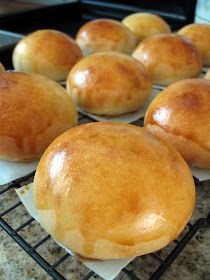 bread rolls cooling on a rack in an oven