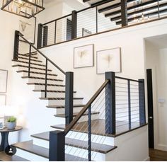 the stairs in this house are black and white