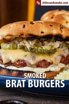 a close up of a sandwich on a plate with the words smoked brat burgers