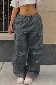 Fit: Regular fit. Detail: Elastic waist. Lace-up. Pockets. Loose. High waist. Material: 100% Polyester. Care： Machine washes cold, tumble dry low. Cargo Pants Women Baggy, Style Salopette, Clothing Oversized, Celana Kargo, Loose Overalls, Celana Fashion, Overalls Fashion, Fall Streetwear, Drawstring Waist Pants