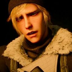 a man with blonde hair wearing a beanie