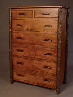 an old wooden dresser with many drawers