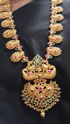 22 Karat Gold "Peacock" Long Necklace with Cz & Beads (Temple Jewellery) - 235-GN3391 - in 126.300 Grams for USD $9845.64. 
Made in India by Totaram Jewelers Online this product is in Gold - 22 Karat BIS Hallmark 916 KDM Gold  & is an excellent gift for Adult - Women. Ships fully insured with secured guaranteed delivery for free with your order over $250 from New Jersey USA & comes with 30 days exchange policy. Gold Bridal Necklace With Peacock Design For Celebration, Wedding Necklace With Peacock Design In Peacock Color, Peacock Design Necklace For Wedding, Wedding Necklace With Peacock Design, Peacock Wedding Necklace With Peacock Design, Peacock Colored Jewelry For Weddings And Festivals, 22k Gold Necklace, Temple Jewelry Necklace, Gold Peacock