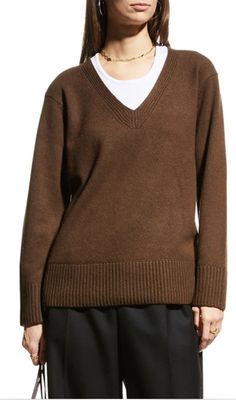 Our exceptionally soft pure cashmere pullover is trimmed by a lush ribbed V-neck and extended ribbed hem and cuffs.Relaxed fit for easy fit Slips on. Rib trim. 100% Cashmere. Ribbed V-Neckline Long Sleeves Imported. Retail $445 Sold out in stores Size-X-Small Color-208 WNT WALNUT BROWN STYLE ID- V782178810  Hand wash cold. Lay flat to dry. Or dry clean. Final Sale, No Returns MEASUREMENTS: ARMPIT TO ARMPIT: 19.5" SHOULDER TO SHOULDER: 17 LENGTH FROM SHOULDER: 25.5" Casual Brown V-neck Sweater For Work, Classic V-neck Fall Sweater, Classic Brown V-neck Sweater For Fall, Brown Cashmere V-neck Sweater, Cashmere V-neck Sweater For Fall, Fall Cashmere V-neck Sweater, Classic Brown Ribbed Sweater, Classic Brown V-neck Sweater For Work, Elegant Brown V-neck Sweater