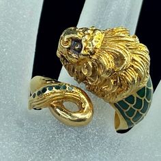 This Is An European Made Statement Ring, Crafted In 18k Yellow Gold, In The Two Bypass Shanks Depicts A Lion Head, The Lion Head Inlay With Multiple Color Of Enamel, And Extend To Part Of The Ring Shank, The Etching Is In Amazing Detail. The Head Is 11.6 X 8.13mm, Ring Size 7.75, Weight 10.1gm, Hallmark 750 (1 Inch = 25.4 Mm; 1 Dime = 17.9mm). All Items Are Pre-Owned Unless Otherwise Stated. This Means They Have The Usual Aspects Of Pre-Owned Jewelry, Such As Light Scratches, Wear And Tarnish. If There Is A Major Dent, Ding, Flaw, Or Bend, It Will Be Noted In The Description. Pre-Owned Jewelry May Contain Minor Markings/Imperfections Throughout. Please Review All Photos Carefully, It Will B Ring Shank, A Lion, Lion Head, Gold Enamel, Multiple Color, The Lion, Gold Yellow, Womens Jewelry Rings, Statement Ring