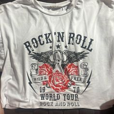 Brand New Crop Rock N Roll Short Sleeve Tee!! White Graphic Rock And Roll T-shirt, White Crew Neck Rock Style Tops, White Graphic Print Rock And Roll Top, White Rock Style Top For Concerts, Rock And Roll Graphic Print Tops For Spring, Rock And Roll Graphic Print Spring Tops, Spring Rock And Roll Tops With Graphic Print, White Rock And Roll Graphic Print Top, White Rock Style T-shirt For Summer