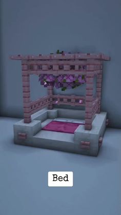 a bed made out of bricks with flowers on top and the words bed below it