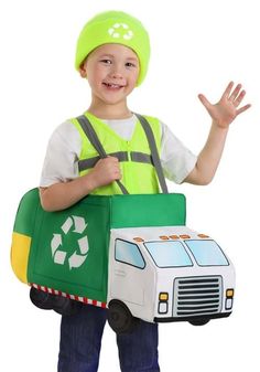 a young boy wearing a green garbage truck costume