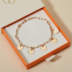 Our Dainty Love Links Bracelet is the perfect personalized bracelet for any occasion piece. Hand-engrave up to 14 characters and cherish the special memories forever.18K Champagne Gold Plated or 925 Sterling SilverChain length &amp; style: 7 Trace ChainCharm: 0.4 Diameter, 0.03 ThicknessCharms are not removable from this chainHand-engraved in our Paris workshopSent with love in a complimentary gift boxAny slight variations in lettering depth, spacing and alignment from the examples shown are part of the aesthetic and originality of the piece. Customizable Yellow Gold Name Bracelet, Rose Gold Charm Bracelet As A Gift, Rose Gold Charm Bracelet For Gift, Personalized 14k Gold Charm Bracelet, Yellow Gold Bracelet With Engraving Option, Customizable Rose Gold Friendship Jewelry, Customizable Rose Gold Jewelry For Friendship, Dainty Charms Bracelets For Personalized Gift, Elegant Name Bracelet With Charms For Friendship