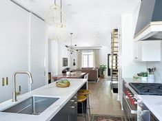 the kitchen is clean and ready to be used as a living room or dining area