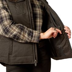 Style number: 10052044. Black vest. Quilted design. Two snap flap chest pockets. Zipper front closure. Zip hand pockets. Spread collar. Wind and water resistant construction. 160g Cool Climate Insulation. Stretch peached twill weave. 57% Cotton, 35% Polyester, 8% Nylon. Black Quilted Vest, Wedding Cowboy Boots, Quilted Gilet, Boots Store, Western Outfits Women, Twill Weave, Black Vest, Quilted Vest, Wide Fit Boots