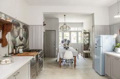 the kitchen is clean and ready to be used as a dining room or family room