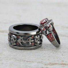 (eBay) His and Hers Skull Couple Rings Red Garnet Skull Wedding Ring Set Gun Metal Fn Couple Skull, Gothic Couple, Rings Skull, Skull Couple, Wedding Rings Sets His And Hers, Gothic Wedding Rings, Skull Cufflinks, Skull Wedding Ring, Gothic Engagement Ring