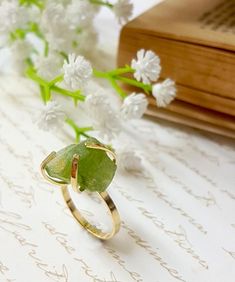 Raw Peridot Ring Raw Stone Ring Peridot Birthstone Ring | Etsy Green Crystal Ring With Stones As A Gift, Green Peridot Crystal Ring With Gemstone, Green Peridot Gemstone Crystal Ring, Peridot Crystal Ring For May Birthstone, Green Peridot Crystal Ring, May Birthstone Crystal Ring For Jewelry Making, Green Crystal Stone Ring For Anniversary, Green Crystal Ring With Natural Stones, Green Crystal Ring With Stones For Anniversary