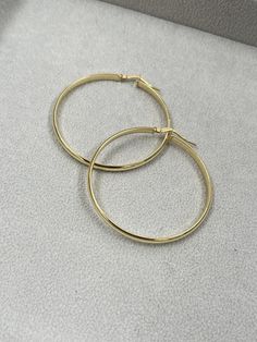 Valentine's Day is around the corner. Is there anything that catches your eye?  Ready to complete your look with our minimal hoop earrings?  Like the rest of our jewelry, the base is sterling silver with a gold plating finish. Our hoop earrings come in many sizes and styles so make sure to check everything we have so you don't miss out! If you would like some without a gold plating finish, please reach out to a team member to see if we can accommodate your wish.  Materials:  - Sterling Silver  - Gold Plating Finish  Extra Details:  As a brand that values transparency, pictures may be taken under different lighting. It is only natural for slight variations in color to occur under different types of lighting. This is an attempt to best communicate our products as an e-commerce brand.  Care D Minimal Hoop Earrings, Jewelry Minimalist, Hoop Earrings Gold, Types Of Lighting, Team Member, Minimalist Modern, Jewelry Earrings Hoops, Gold Plated Silver, Style Moderne