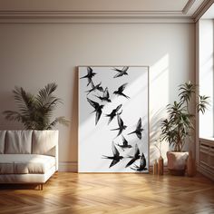 a living room with a white couch and large painting on the wall next to a potted plant