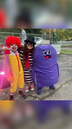 two people in costumes standing next to each other