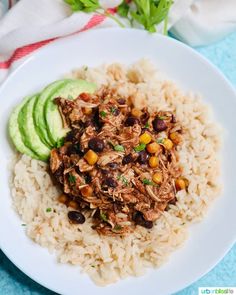 a white plate topped with rice and beans