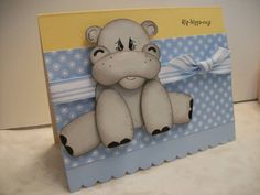 a card with a stuffed animal on it