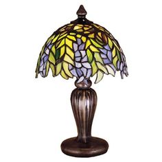 a table lamp with a stained glass shade on the top and bottom part of it